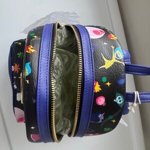 Loungefly Black Backpack with Purple Trim and Colorful Characters